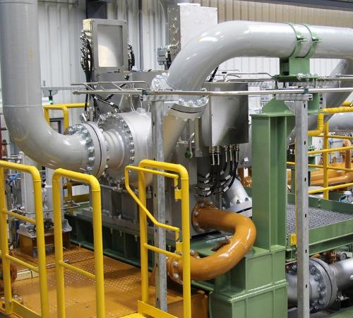 Integrally geared centrifugal compressor for process gases